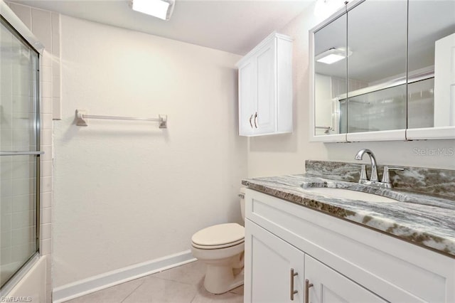 full bathroom featuring tile floors, large vanity, combined bath / shower with glass door, and toilet