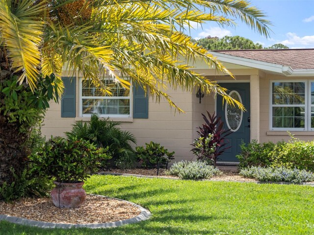 view of property exterior featuring a yard