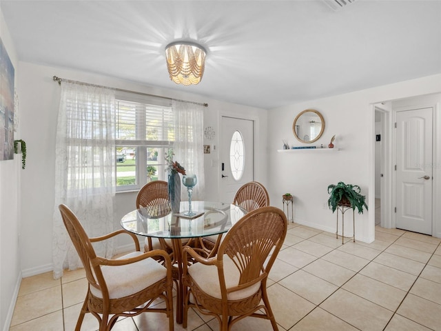 view of tiled dining space