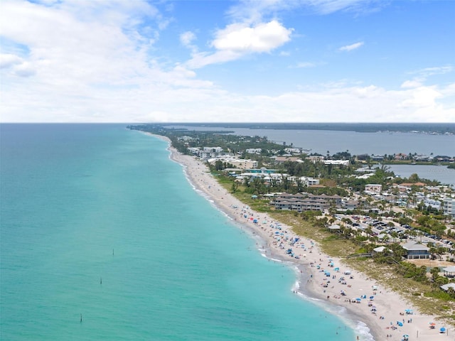 aerial view featuring a water view and a beach view