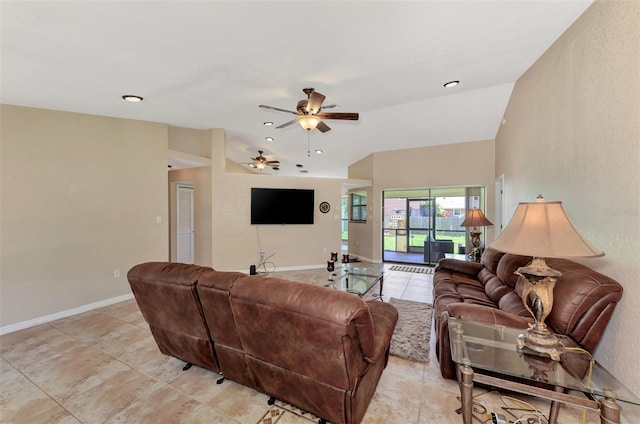 tiled living room with ceiling fan