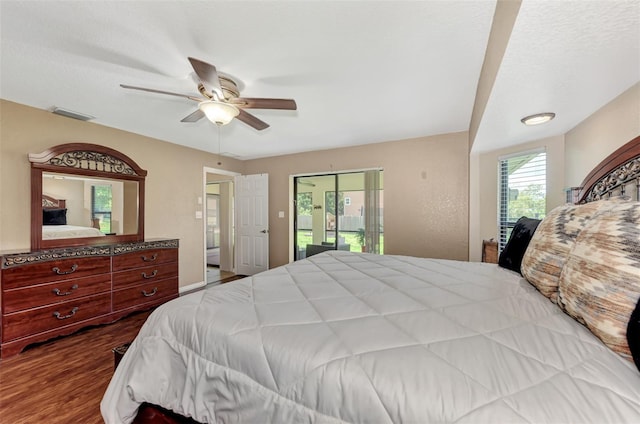 bedroom with hardwood / wood-style flooring, access to outside, and ceiling fan