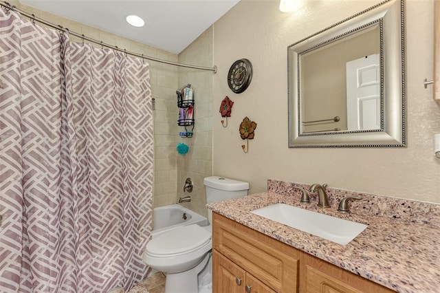 full bathroom with vanity, toilet, and shower / bath combination with curtain