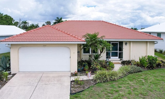 view of front facade with a front lawn and a garage