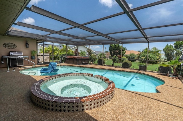 view of swimming pool featuring an outdoor hot tub, a patio, and glass enclosure