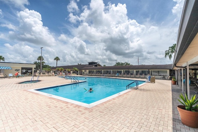 view of pool with a patio