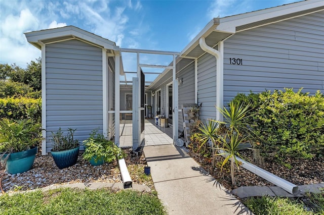 doorway to property with a patio