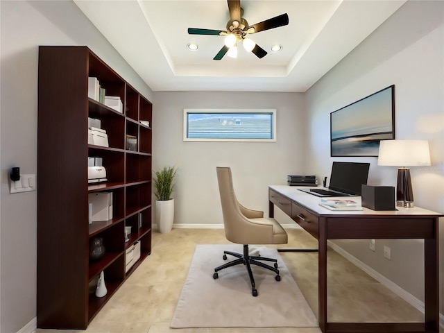 2730 Vareo Ct, Cape Coral, FL 33991 - office space featuring a raised ceiling, a ceiling fan, and baseboards