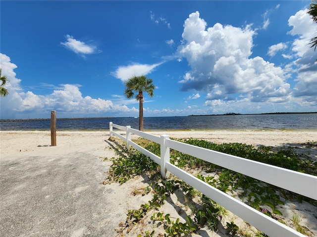 property view of water featuring a beach view