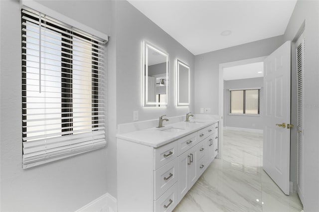 bathroom featuring vanity and plenty of natural light