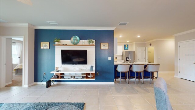 tiled living room featuring ornamental molding