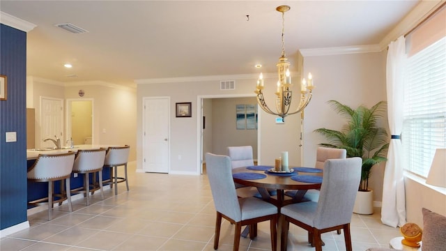 tiled dining room featuring a notable chandelier and crown molding