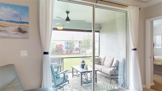 interior space featuring a healthy amount of sunlight and a ceiling fan