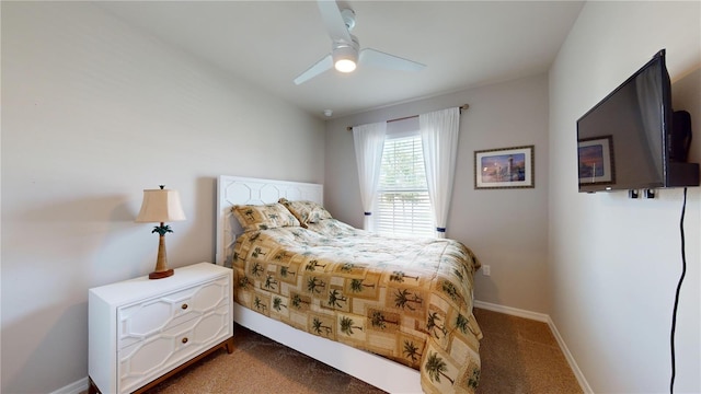 bedroom featuring carpet flooring, a ceiling fan, and baseboards