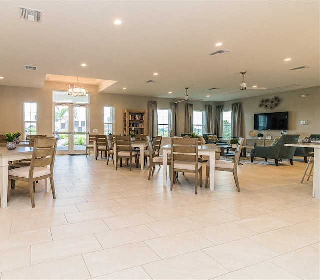 dining area with recessed lighting, visible vents, and french doors