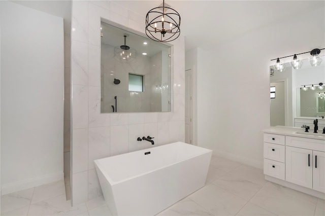 bathroom with vanity, tile walls, an inviting chandelier, and plus walk in shower