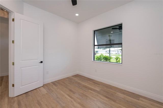 unfurnished room featuring light hardwood / wood-style floors