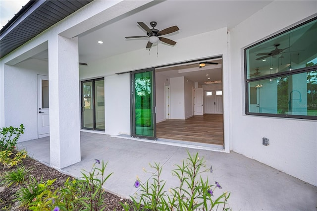 view of patio / terrace featuring ceiling fan