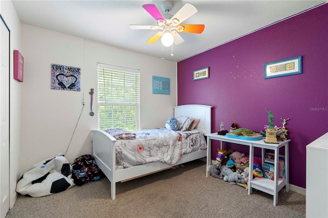 bedroom featuring carpet and ceiling fan