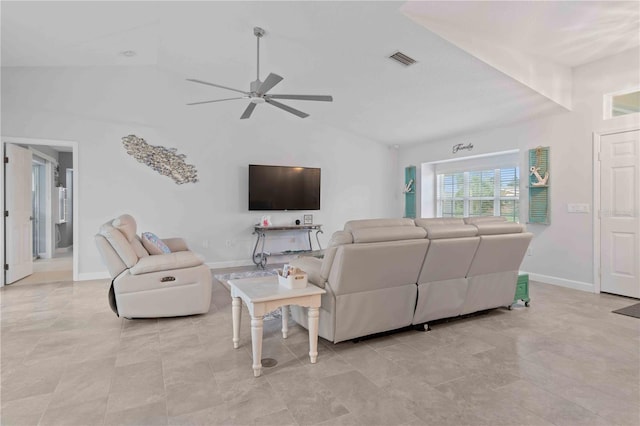 living room featuring ceiling fan and vaulted ceiling