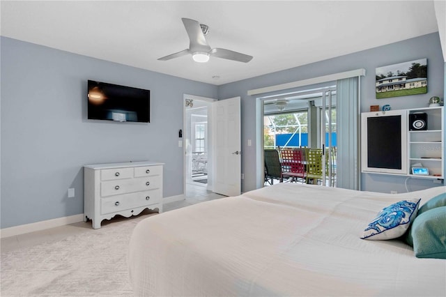 bedroom with ceiling fan, light tile patterned floors, and access to outside