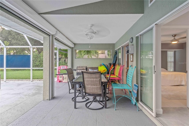 sunroom / solarium with ceiling fan