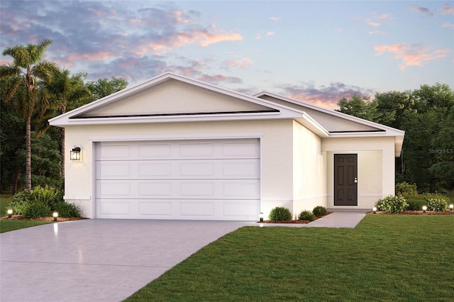 ranch-style house featuring a garage and a yard