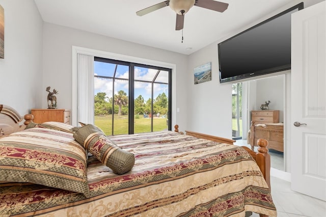 bedroom featuring access to exterior, ceiling fan, and light tile patterned flooring