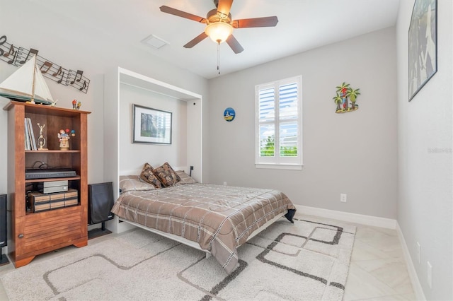 bedroom featuring ceiling fan