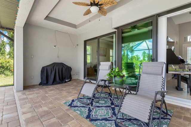 view of patio / terrace featuring ceiling fan