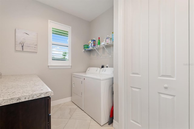 clothes washing area featuring washing machine and dryer