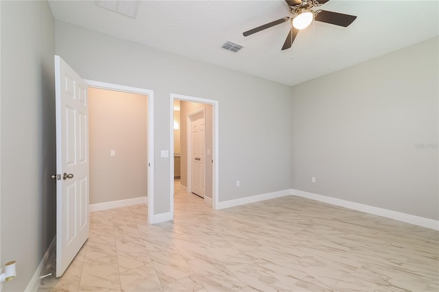 unfurnished bedroom featuring ceiling fan