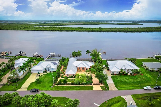 birds eye view of property featuring a water view