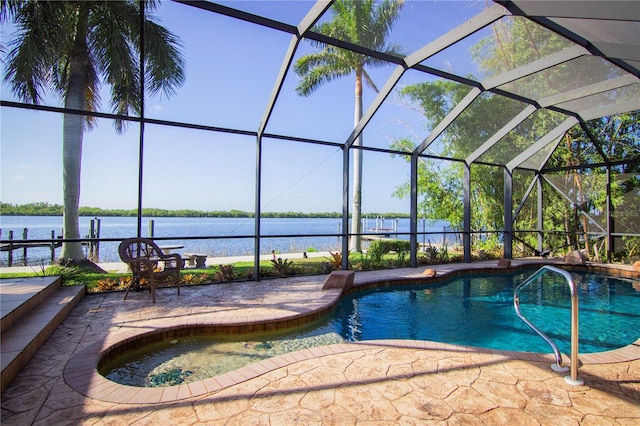 view of swimming pool featuring a water view, a patio, and a lanai