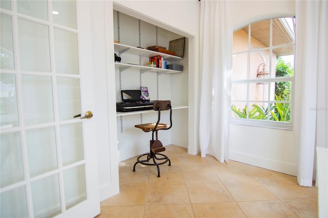 tiled office featuring built in desk