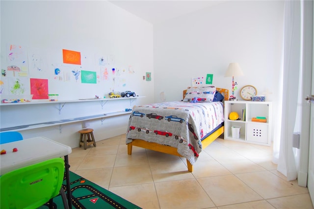 bedroom featuring light tile patterned flooring