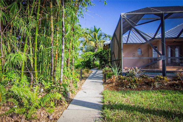 view of yard with a lanai