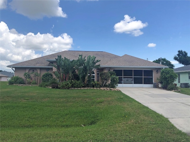 ranch-style house featuring a front yard and central AC