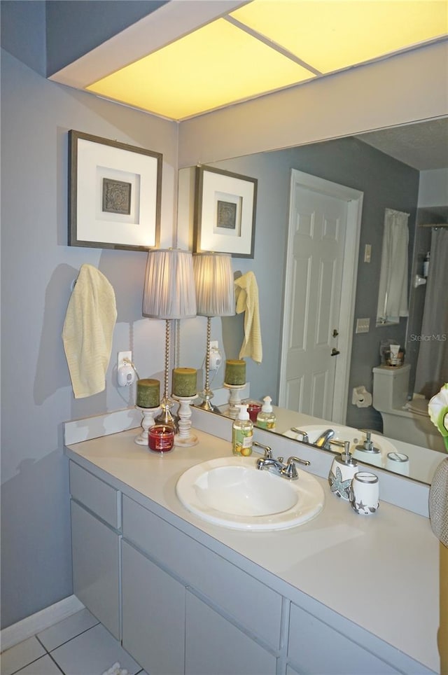 bathroom featuring vanity and tile patterned floors