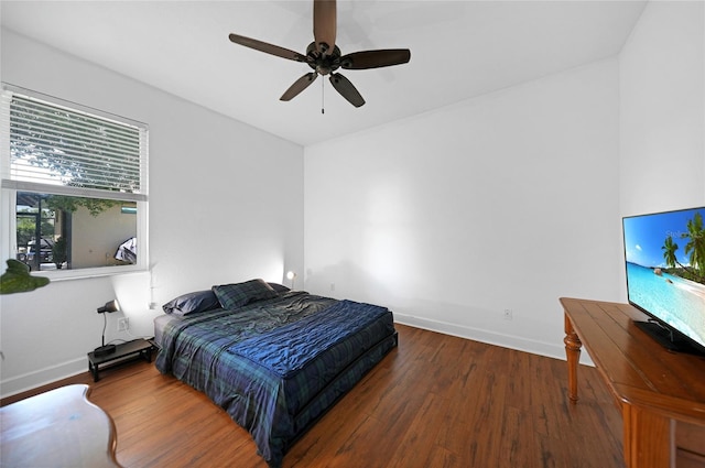 bedroom featuring dark hardwood / wood-style floors and ceiling fan