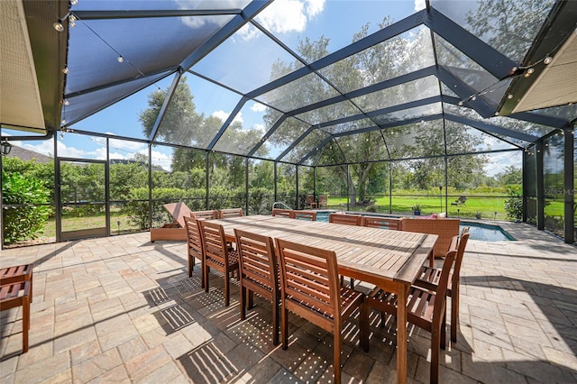 view of patio with a lanai