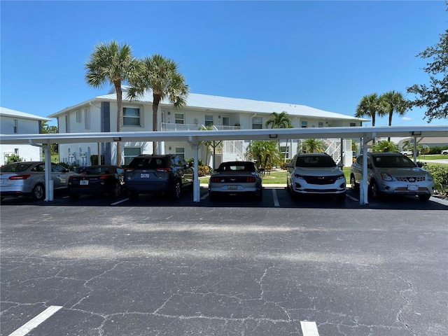 view of parking featuring a carport