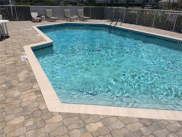 view of pool featuring a patio area