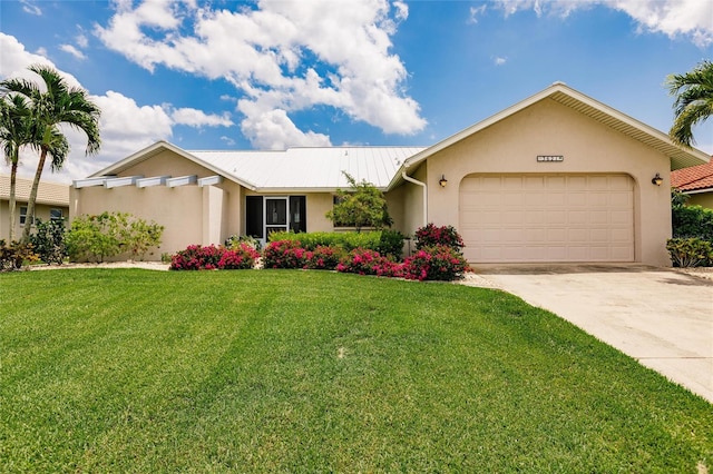 single story home with a front lawn and a garage