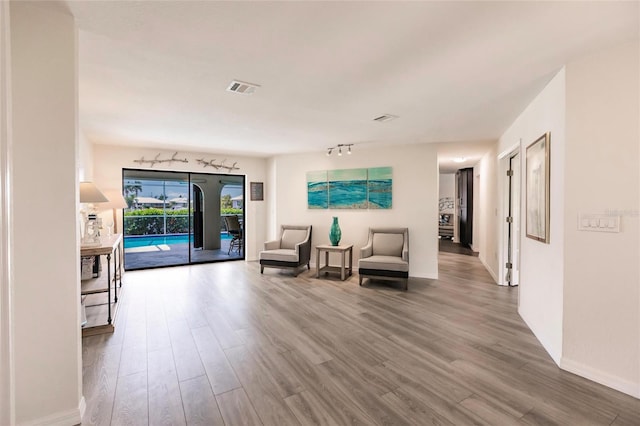 living area featuring hardwood / wood-style flooring