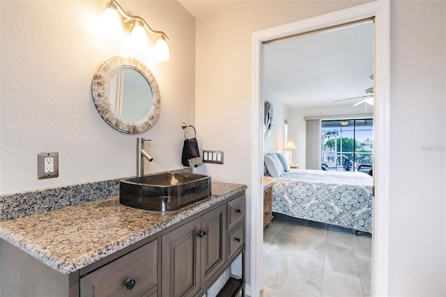 bathroom with vanity and ceiling fan