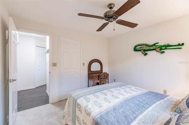 bedroom featuring ceiling fan and light tile patterned floors