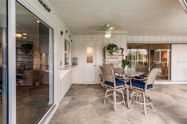 dining room with ceiling fan