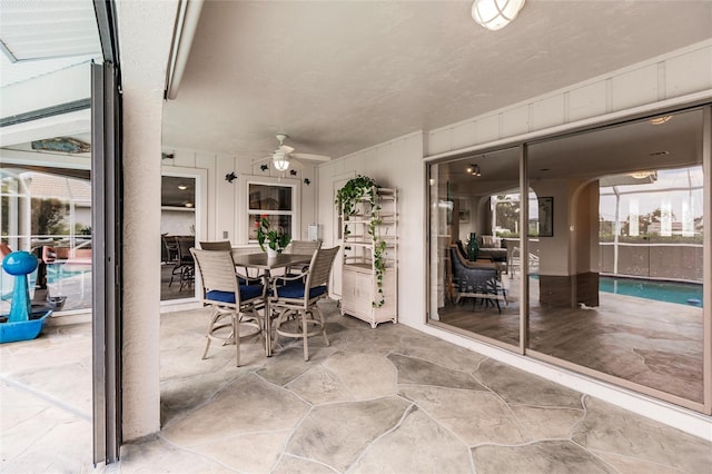 view of patio with ceiling fan