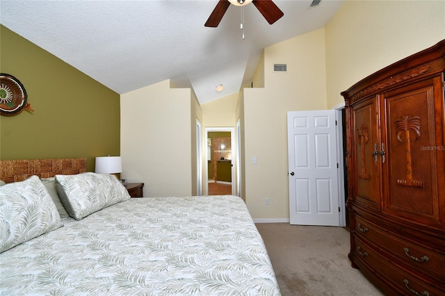 carpeted bedroom with ceiling fan and lofted ceiling